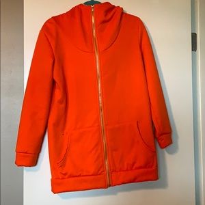 Fuzzy orange high neck zip up with hood